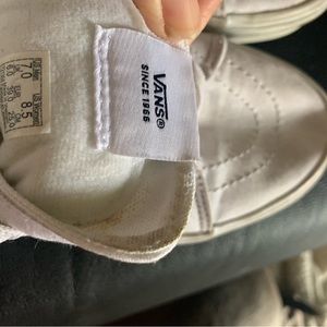 Hi top white Vans. One shoelace missing ….Bottom traction perfect.